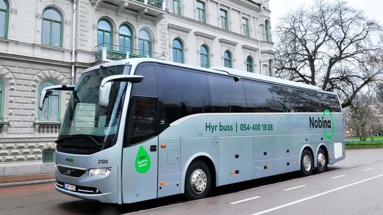 A grey bus for rental services